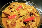 Утка, тушенная с апельсинами