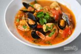 Жаркое с рыбой и морепродуктами в томатном соусе