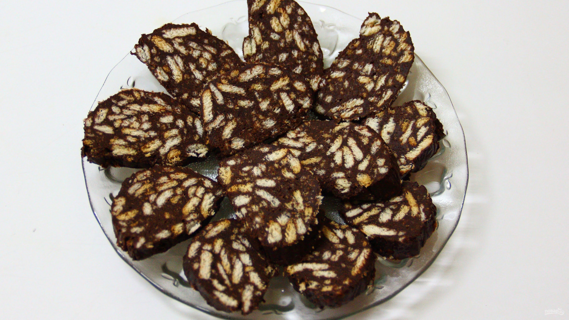 Шоколадная колбаса из печенья пошаговый рецепт с фото с со сгущенкой и маслом и какао