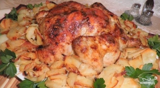 Курица, фаршированная картофелем