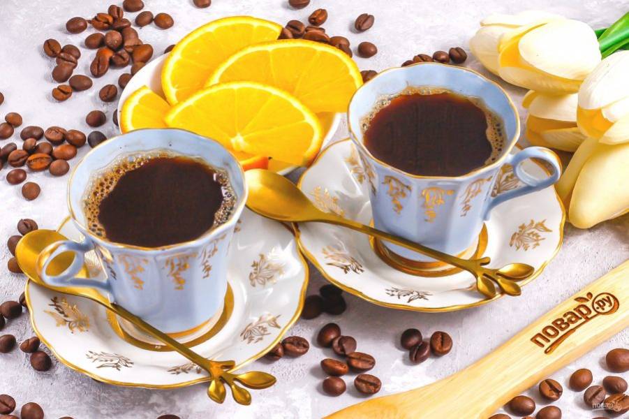 Разлейте кофе по-карибски в приготовленные чашки и подайте к столу горячим.