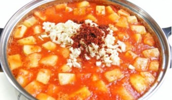 Кабачки, жареные в томатном соусе, на зиму - фото шаг 3