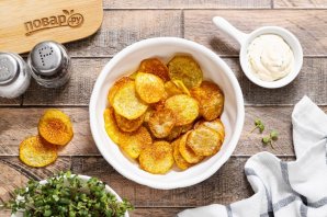 Картофельные чипсы в духовке без масла - фото шаг 10
