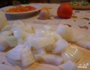 Кальмары, фаршированные рисом и овощами - фото шаг 2