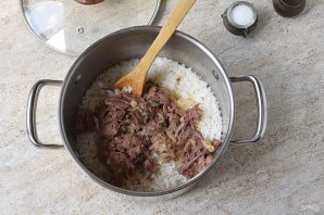 Рис с тушенкой - фото шаг 8