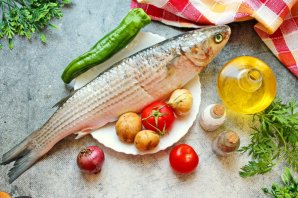 Кефаль, запеченная в духовке - фото шаг 1