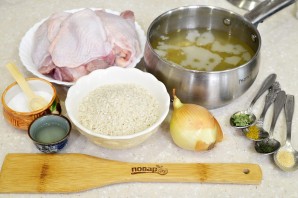 Куриные бедрышки с рисом в духовке - фото шаг 1