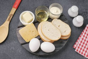 Бутерброды с яйцом и сыром в духовке - фото шаг 1