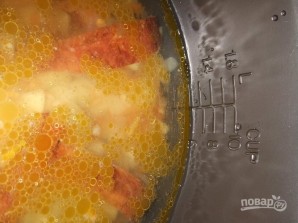 Гороховый суп на копченых ребрышках - фото шаг 6
