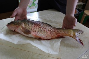Рыба, запеченная с квашеной капустой - фото шаг 1