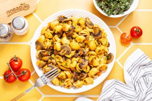 Макароны с шампиньонами