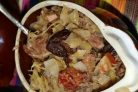 Утка, тушенная с капустой и черносливом