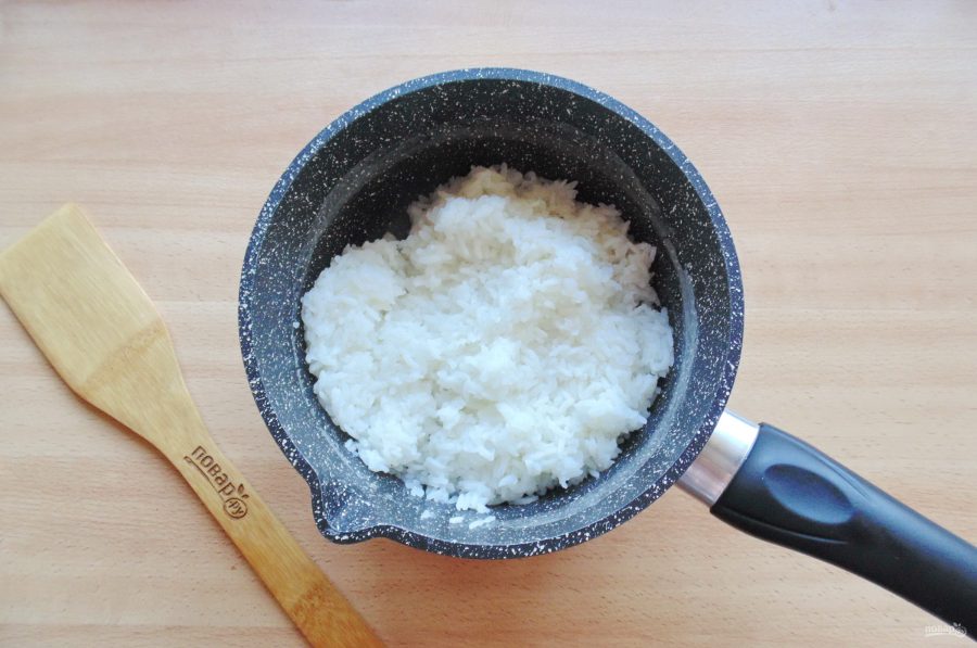 Морской окунь с рисом в духовке